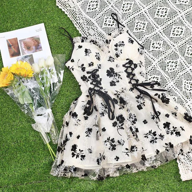 White dress with outlet black flowers