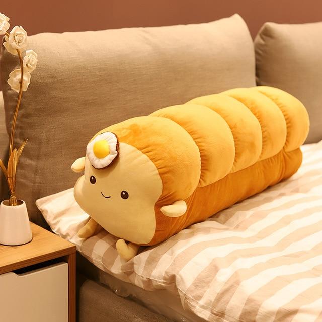 Benedict Bread - Loaf Edition plushy, He's a hunk of bread, and he's here to cuddle! Benedict Bread is the perfect addition to your bedtime routine. He's soft, he's cuddly, and he smells like freshly baked bread.
