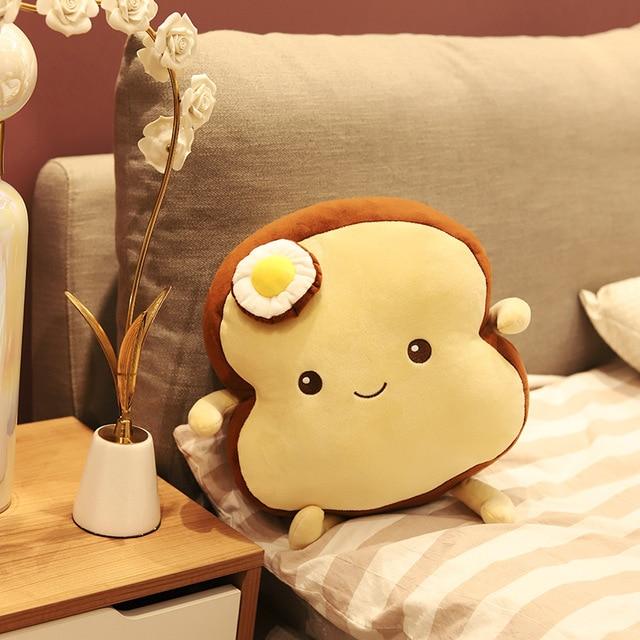 Youeni Benedict Bread - Slice Edition is finally here, and he's ready to be your new best friend. With his soft, squishy body and warm, comforting smell, Benedict is sure to make you feel better no matter what's going on in your life. Order your Benedict Bread - Slice Edition plushy today!