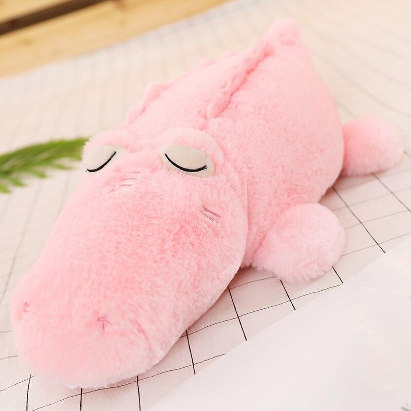 Youeni The fluffiest croc plushies you'll ever come across! Noses Aren't Just for Smelling Big Nose Croco Snuggle Buddies are the perfect cuddling companion for anyone who loves crocs, big noses, or both! These huggable plushies are sure to become your new best friend.